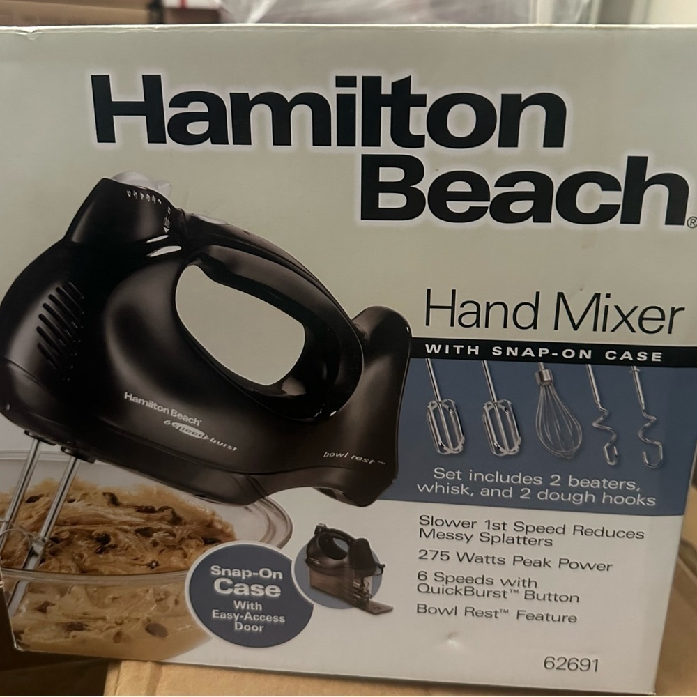 Hamilton Beach hand mixer includes 2 beaters, whisk, and 2 dough hooks